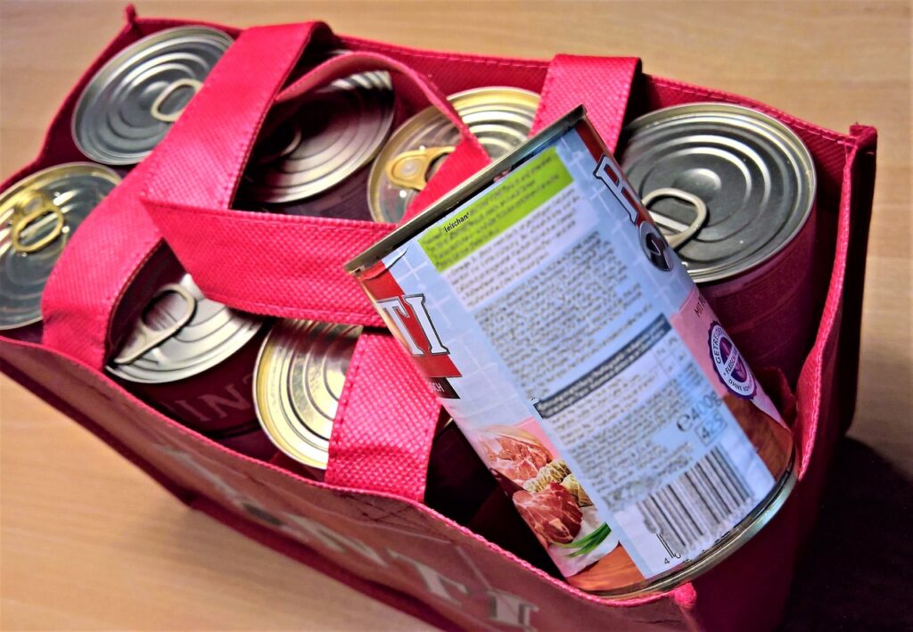 A box of canned dog food 